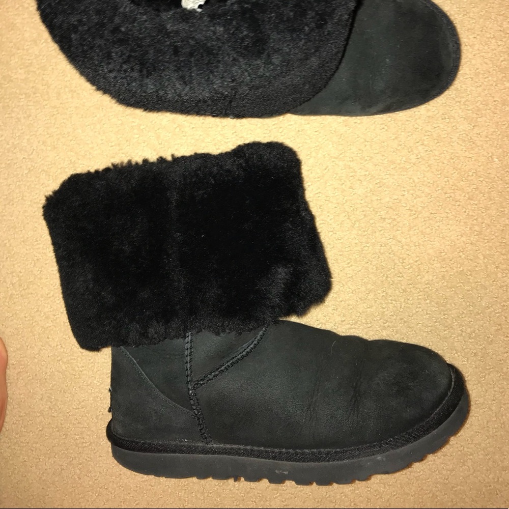 Tall black UGG boots